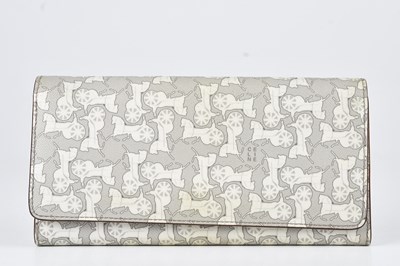 Lot 1269 - CELINE; a coated canvas cream and grey long...