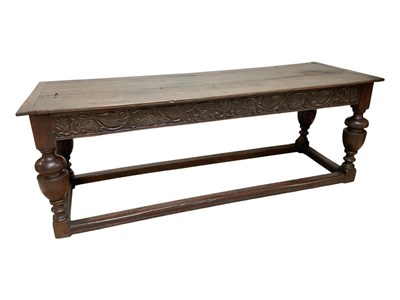 Lot 1048 - A 17th century and later oak refectory type...