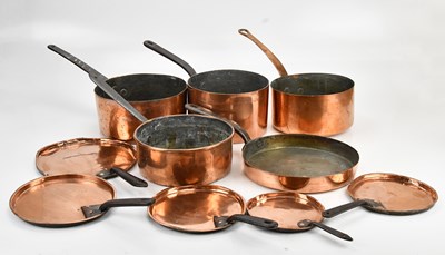 Lot 2116 - Four late 19th century copper saucepans, one...