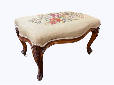 Lot 1230 - A Victorian carved walnut serpentine stool,...