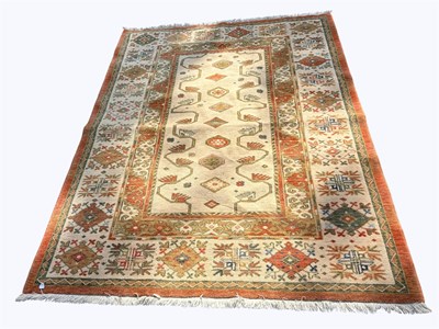 Lot 1406 - A Caucasian machine woven wool carpet, with...