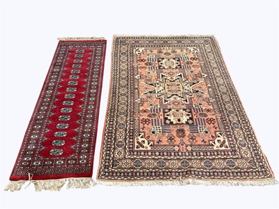 Lot 1392 - A Caucasian hand woven rug, worked with an all...