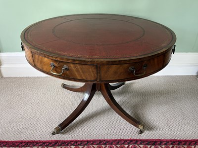 Lot 1149 - A Regency style mahogany drum top library...