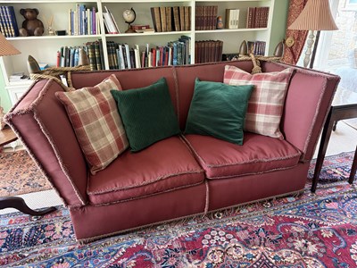 Lot 1201 - A Knowle settee, with red upholstery and...