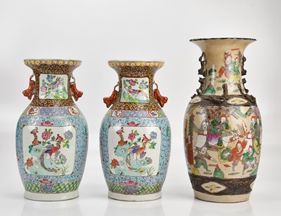 Lot 1643 - A pair of modern Chinese Famille Rose vases,...
