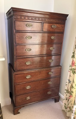 Lot 1057 - A George III oak chest on chest, the upper...