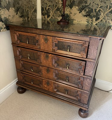 Lot 1050 - A 17th century and later oak chest, with four...