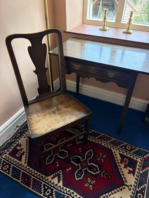 Lot 1071 - A George III oak side table, with drawer and...