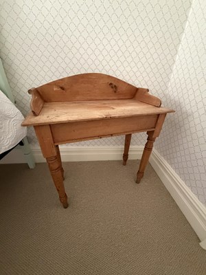 Lot 1298 - A Victorian pine wash stand, on turned legs,...