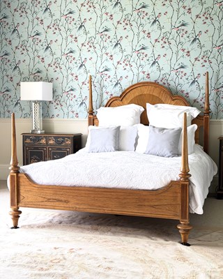 Lot 1161 - A walnut four poster style bed, with four...