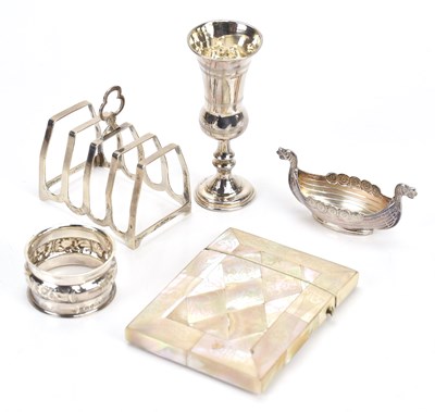 Lot 450 - A hallmarked silver toast rack, Sheffield 1936,...
