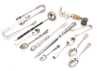 Lot 284 - Two hallmarked silver sugar tongs, and three...