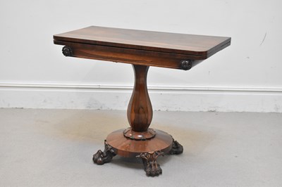 Lot 1205 - A William IV rosewood card table, on baluster...
