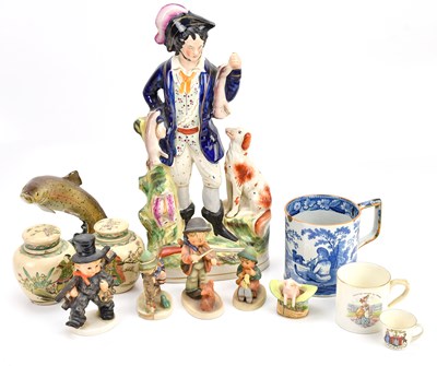Lot 1291 - A tall Staffordshire figure of a huntsman,...