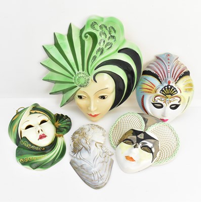 Lot 187 - Four pottery and porcelain wall mounted face...