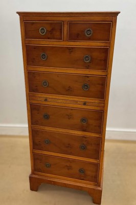 Lot 707 - A modern walnut veneered tallboy, with two...