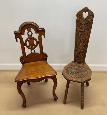 Lot 701 - Two oak chairs, comprising a high backed Welsh...