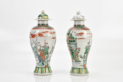 Lot 1159 - A pair of Chinese Famille Vert vases and...