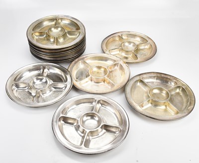 Lot 1468 - Seventeen metal serving dishes, each with five...