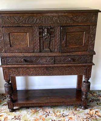 Lot 85 - A Jacobean Revival style court cupboard,...