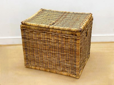 Lot 684 - A large industrial wicker laundry basket,...