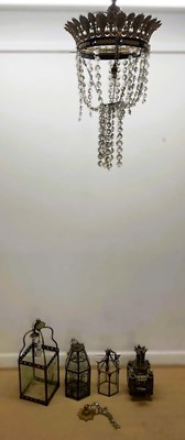 Lot 623 - A chandelier with a brass leaf design top and...
