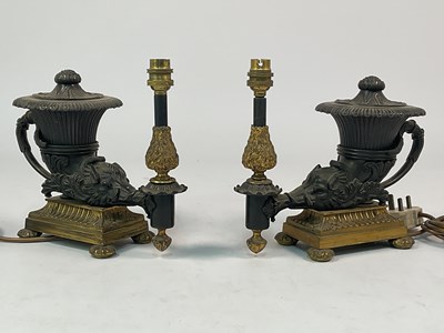 Lot 615 - A pair of early 20th century patinated table...
