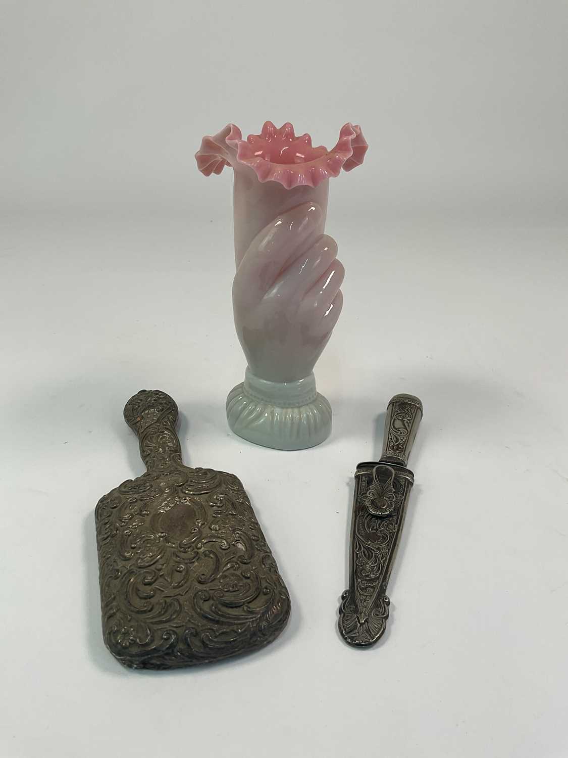 Lot 20 - An Eastern white metal mirror, knife and...