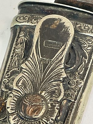 Lot 20 - An Eastern white metal mirror, knife and...