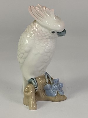 Lot 228 - ROYAL DUX; a porcelain model of a cockatoo,...