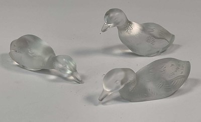 Lot 324 - BACCARAT; three crystal models of ducks,...