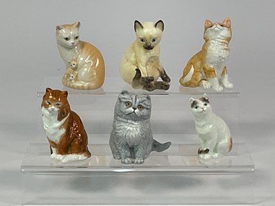 Lot 293 - ROYAL WORCESTER; six porcelain models of cats...