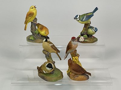 Lot 294 - ROYAL WORCESTER; four porcelain bird models,...