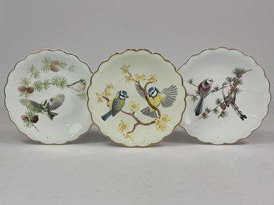Lot 291 - ROYAL WORCESTER; three handpainted raised...