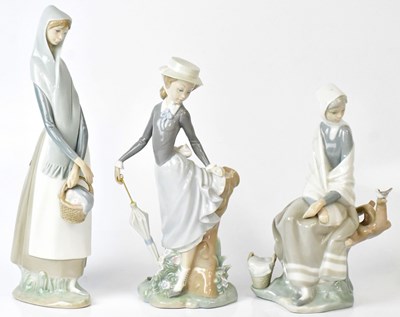 Lot 163 - LLADRÓ; three figures of ladies comprising...