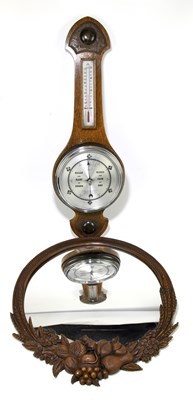 Lot 1757 - A reproduction carved mirror of circular form