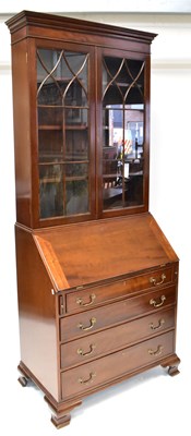 Lot 60 - A Georgian-style mahogany bureau bookcase,...