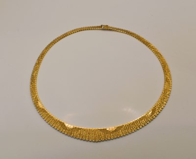 Lot 520 - A 14ct gold Fringe necklace, stamped 585,...