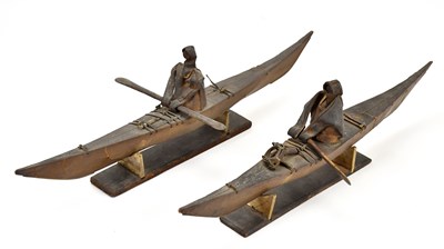 Lot 2005 - A pair of Inuit hide and wood model kayaks,...