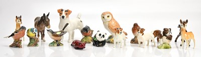 Lot 1468 - BESWICK; a collection of animals comprising...