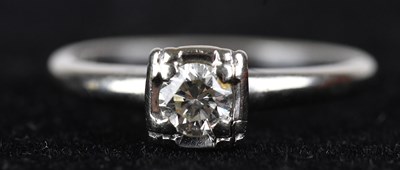 Lot 425 - An Art Deco diamond set solitaire ring, the...