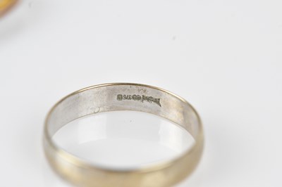 Lot 15 - A 9ct yellow gold wedding band, size Q, and an...