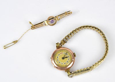 Lot 125 - An Edwardian 9ct gold amethyst set bar brooch,...