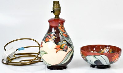 Lot 209 - MOORCROFT; a 'Red Tulip' pattern lamp base,...