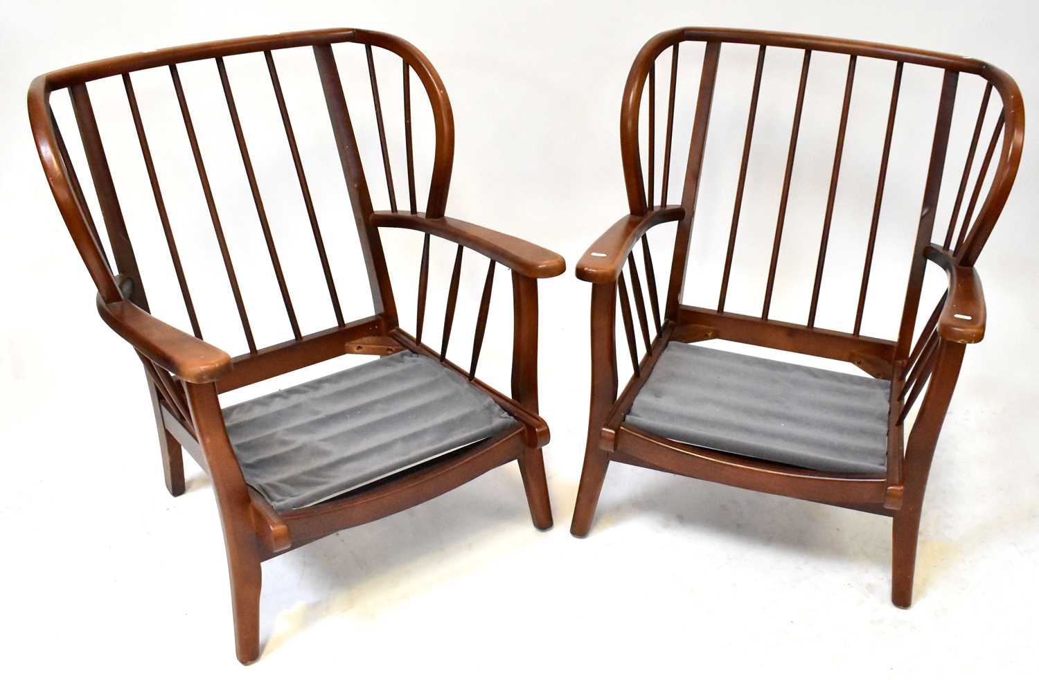 Lot 5 - ERCOL; an elm and beech mid-colour three-piece...
