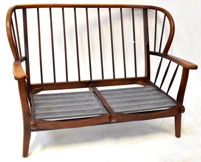 Lot 5 - ERCOL; an elm and beech mid-colour three-piece...