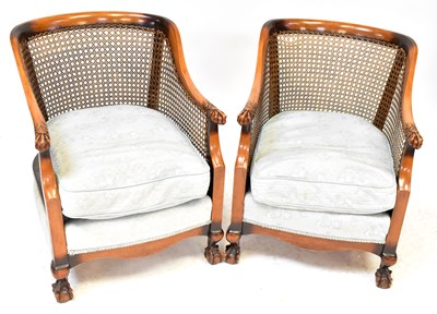 Lot 38 - A mid-20th century carved walnut bergère suite...