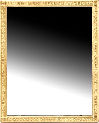 Lot 104 - A gilt carved rectangular wall mirror with...