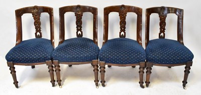 Lot 12 - A Georgian-style walnut dining table, with...