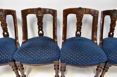 Lot 12 - A Georgian-style walnut dining table, with...